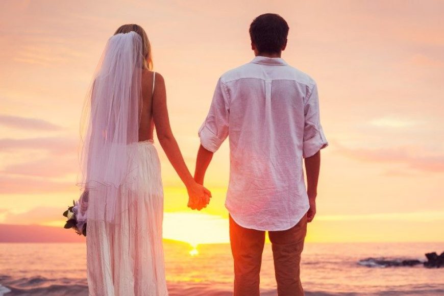 Bride and Groom, Enjoying Amazing Sunset on a Beautiful Tropical Beach, Romantic Married Couple
